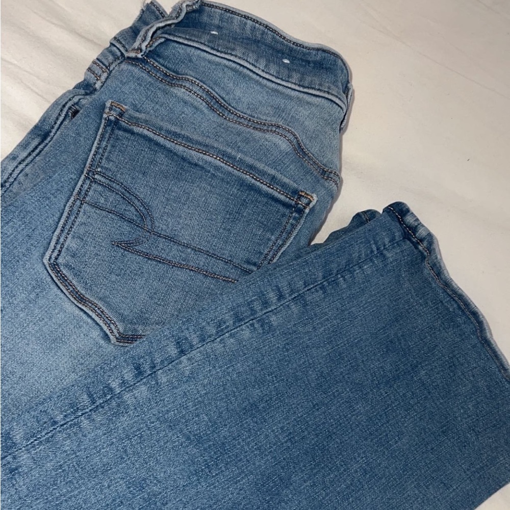 American Eagle Jeans size 0 super stretchy can fit 2 sizes bigger.